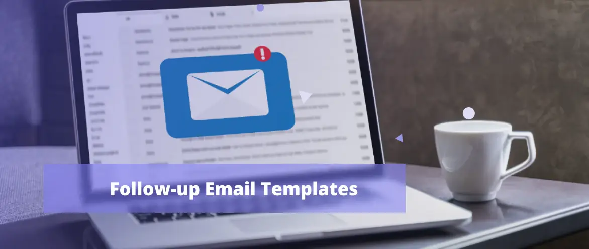A laptop with an unread email displayed on the screen and a coffee mug put next to it are placed on top of a table.